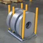 Slitted narrow steel coils stored safely on heavy-duty European-engineered coil cradles and racking systems inside a modern industrial warehouse
