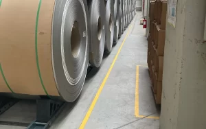 Engineered coil saddle system used in automated and unmanned industrial coil storage
