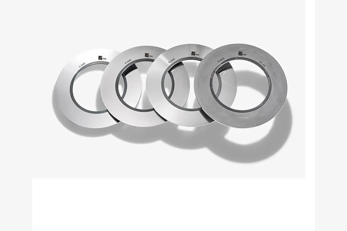 High-precision TKM rotary slitter knives and spacers with GLT Mühendislik engineering support for global metal and automotive industries.