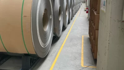 Engineered coil saddle system used in automated and unmanned industrial coil storage