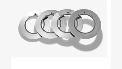 High-precision TKM rotary slitter knives and spacers with GLT Mühendislik engineering support for global metal and automotive industries.